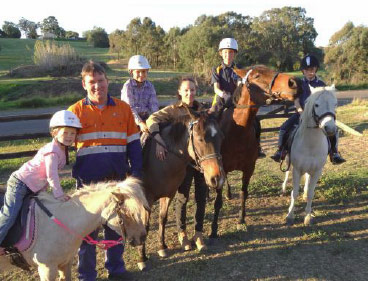 Miriam, Phil, Isabelle, Penny, Matilda and Olivia U’Ren balance their love of horses with pride for the mining industry.