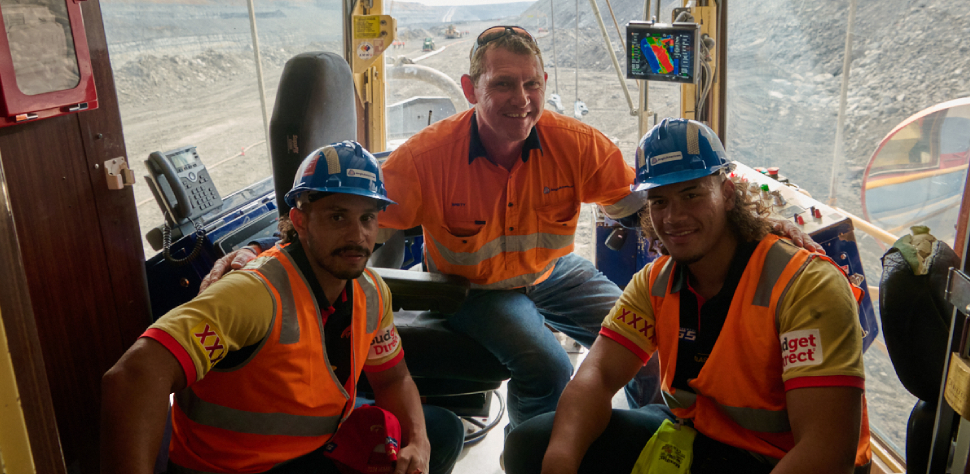 employees posing for a picture