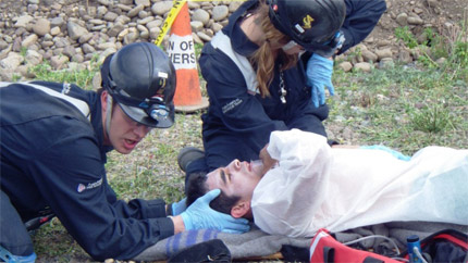 Shane Muise (left) and Hailey Nehring attend to a patient during British Columbia’s provincial competition held in Smithers.